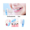 Orthodontic toothbrush with a tuft and a small head, White